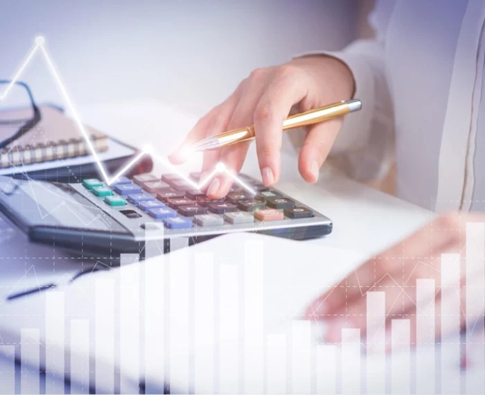 A person working with a calculator